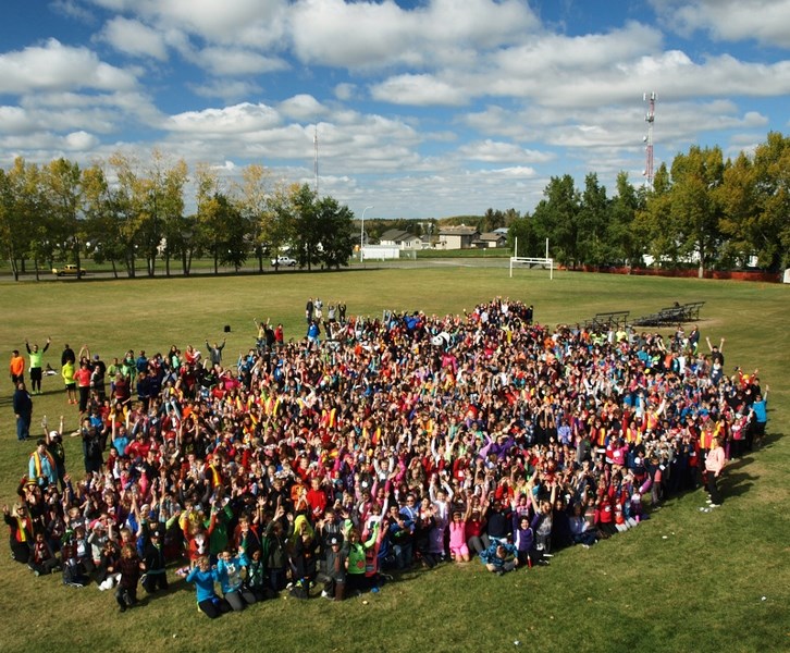 Students from Innisfail&#8217;s five schools group together at the local campus to celebrate the start of the annual Terry Fox Run on Sept. 26.