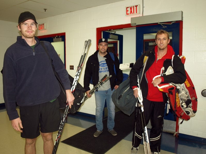 The Innisfail Eagles had their first practice for the upcoming season in Innisfail on Sept. 26. Heading into the Arena (left to right) are defenceman Adam McPherson, forward