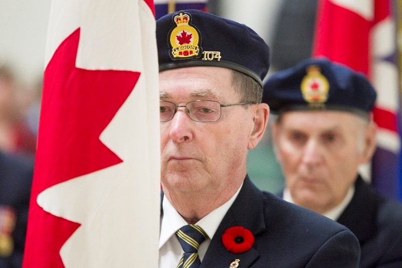 A legion member marches in the colour party during the Innisfail Middle School&#8217;s Remembrance Day ceremony on Nov. 6.