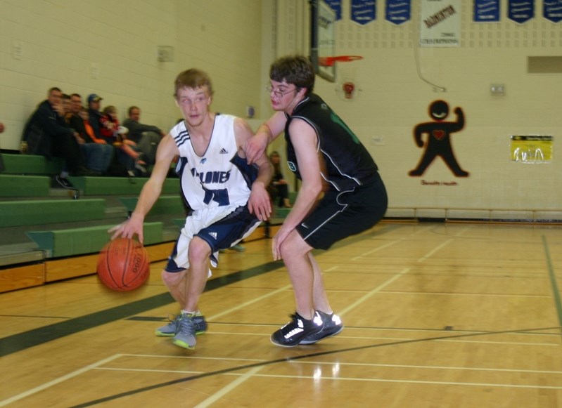 Colton Webster of the Innisfail Senior High Cyclones looks to drive to the hoop during their 75-21 victory over the Ponoka Composite High School Broncs on Dec 18.