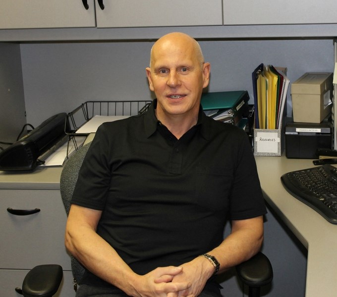 Ken Lebel, Innisfail Family Community Support Services mental health professional, prepares for his first day of work on Jan. 7.