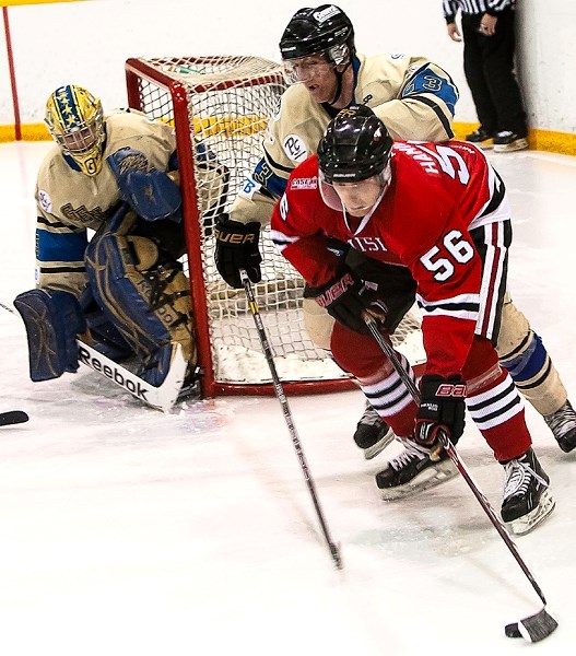 Innisfail&#8217;s Wyat Hamilton comes from behind the net in an attempt to score in Saturday night&#8217;s 3 &#8211; 0 loss to the Bentley Generals.