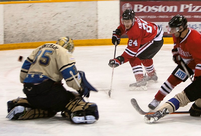 Michael Kneeland scores Innisfail&#8217;s fourth goal in Saturday night&#8217;s playoff game against the Bentley Generals.