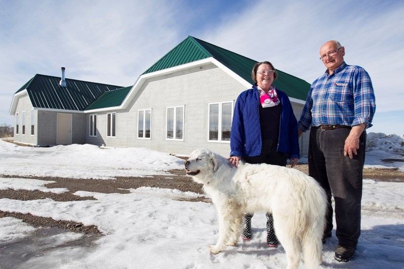 Jose and Jac Hoppenbrouwers of White Creek Meats pose in front of their acreage just outside of Innisfail.