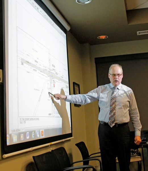 Rick Binnendyk, Penhold&#8217;s chief administration officer, explains the finer points of the Hwy. 42/Waskasoo Avenue intersection on March 10 at the Penhold council meeting.