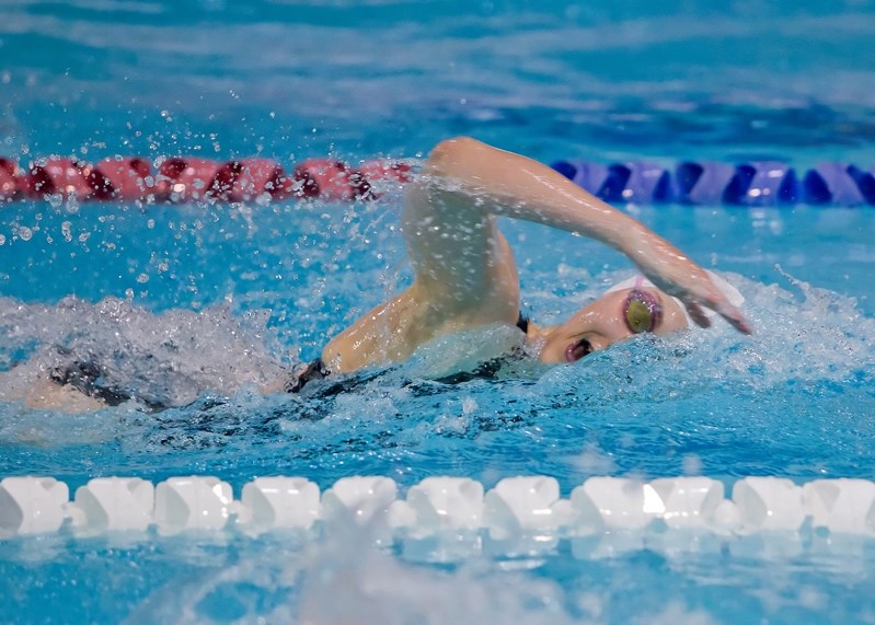 Innisfailian Nicole Cossey strokes with a clear mission during a recent Simon Fraser University Clan Cup Swim Meet.