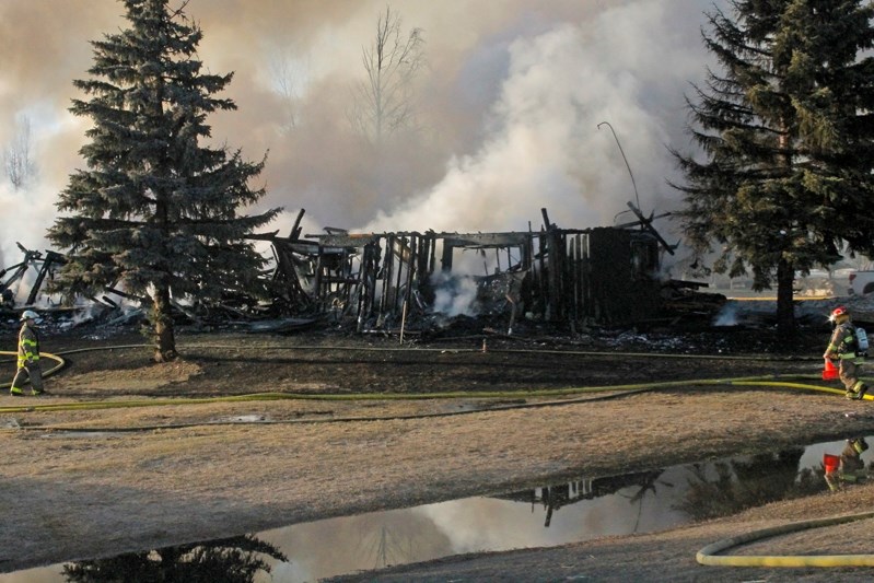 Firefighters are still trying to battle fires underneath the ruins of Wild Rose Manor that was destroyed during a devastating blaze Thursday (April 10) evening.