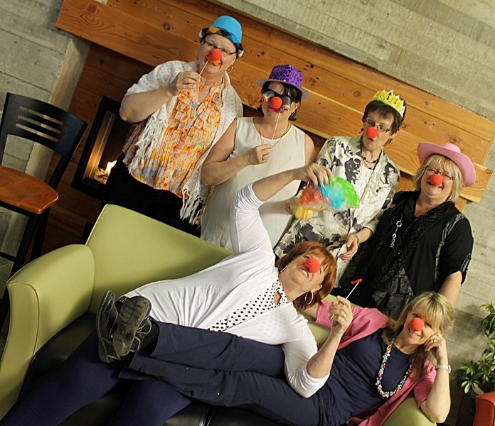 Big Brothers and Big Sisters of Innisfail volunteers celebrate their inner clown. From Back left to right, June Bush, Colinda Chambers, Jill Pederson, and Lucille