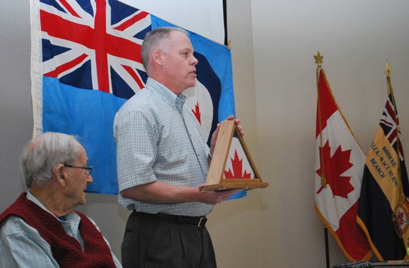 Willard Kathan, left, turned 100 years old on April 25 with a party at the Innisfail Royal Canadian Legion.