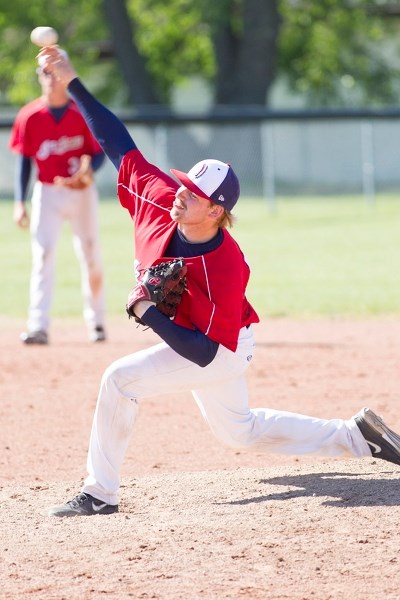 Innisfail Indians player Jay Kirhham pitches a ball during the Indians game against the Calgary Dirt Devils in Innisfail on June 8. The game was part of The Dallas Yarbrough