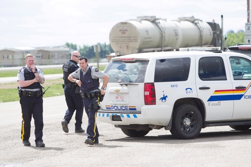 Police wait for suspect to make move prior to their takedown in Bowden.