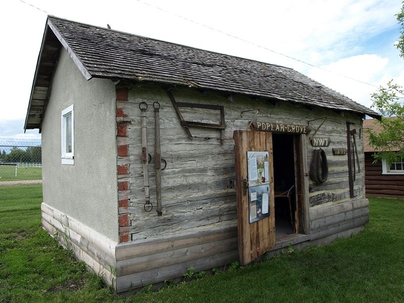 Innisfail Historical Village&#8217;s Poplar Grove cabin plays host to visitors during the busy summer while teaching history.