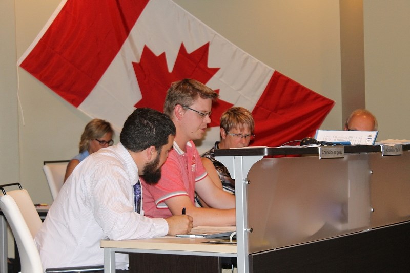 Mike Walsh speaks passionately on the issue of parking along Fleming Avenue during the June 23 Penhold council meeting.