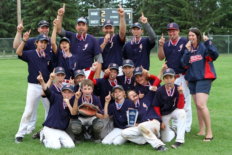 2014 Tier II Innisfail Peewee AA players celebrate their Provincial championship. From left to right back row: Lance Clay, Ethan Alverez, Rob Simpson, Kent Baumgardt, Tom