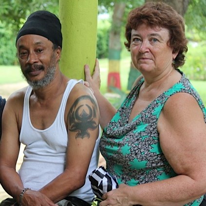 Pat Bidart with a Jamaican man in Kingston.