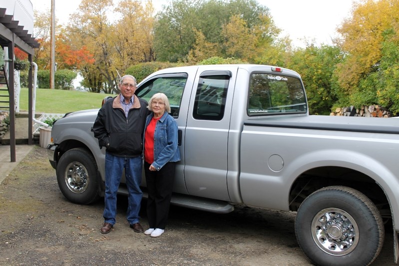 Gerald and Lucille Ohrn pose by the truck he was nearly deemed incompetent to drive due to mandatory cognitive testing recently. At the age of 80 his licence was taken and