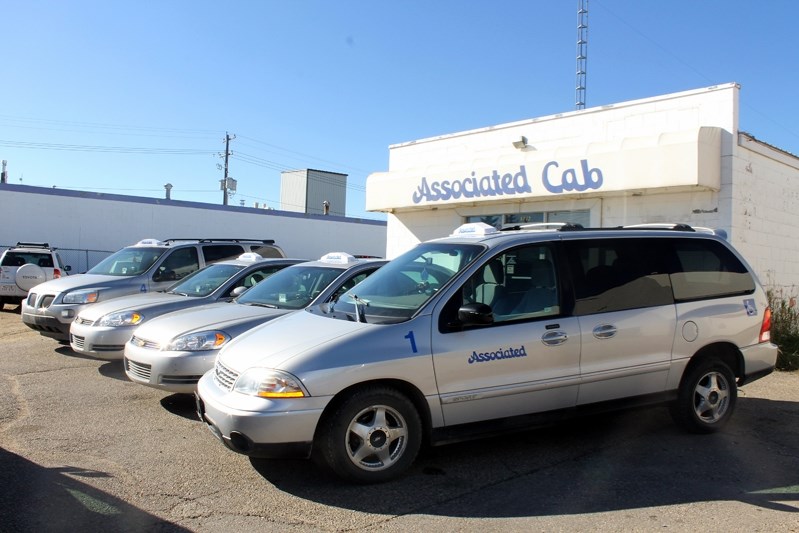 The fleet of four taxis designated for exclusive service for Innisfail still sit outside the office of Associated Cab Red Deer while the company desperately tries to find