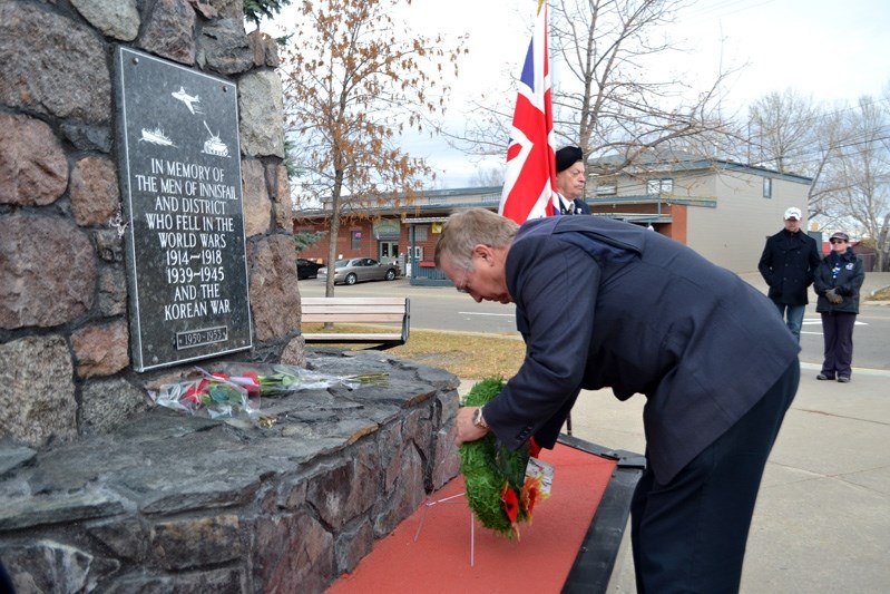 Red Deer MP Earl Dreeshen returned home from Ottawa on Oct. 24, and came to Innisfail the next day to lay a wreath at the cenotaph in hour of the two soldiers murdered lin