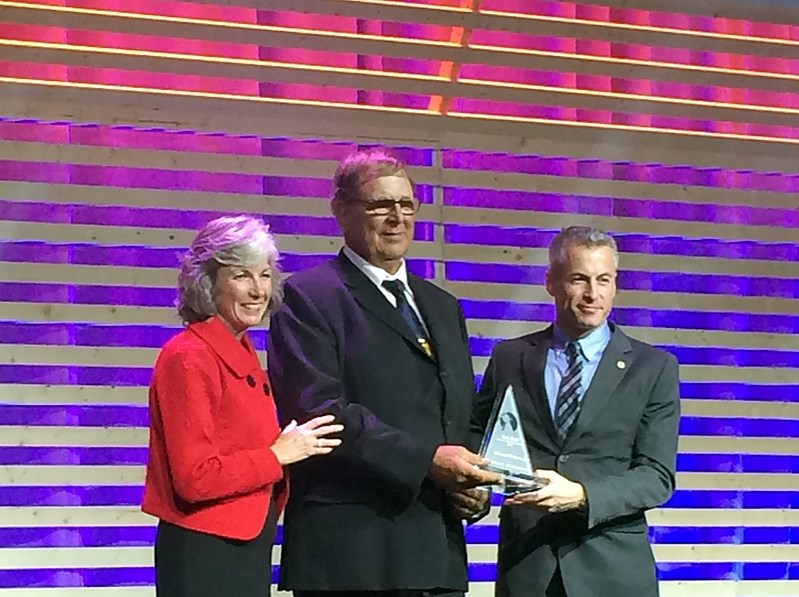 Doug Bos, the co-owner of Discovery Wildlife Park, (centre) accepts the Travel Alberta Alto Award on Oct. 20 for his zoo&#8217;s outstanding customer service.