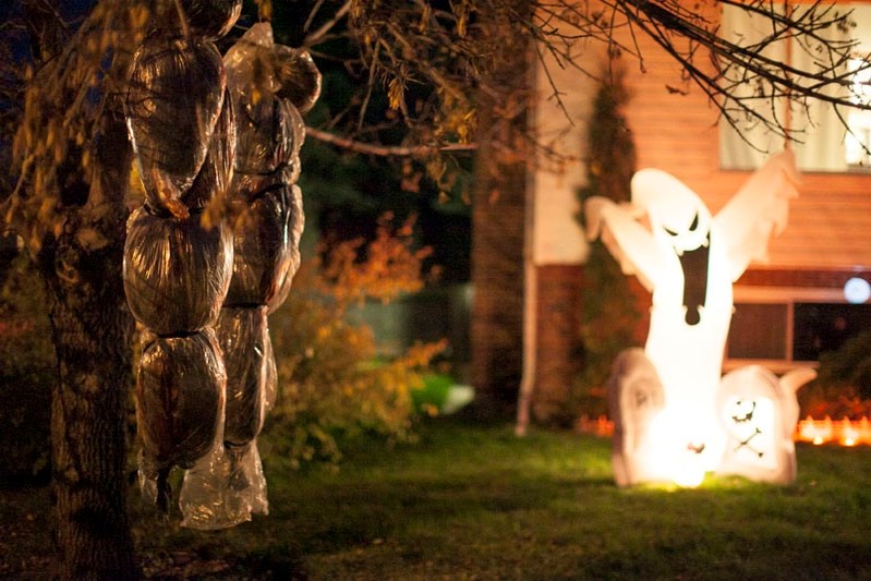 The front lawn of the home of Kristen Spatz and Tyson Thompson is adorned with all sorts of scary icons, including a big ghost.