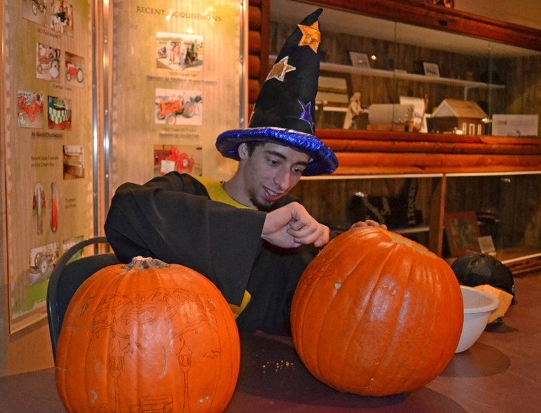 Innisfail&#8217;s Cody White, 19, is dressed as a wizard whose magical task this Halloween is to carve pumpkins.