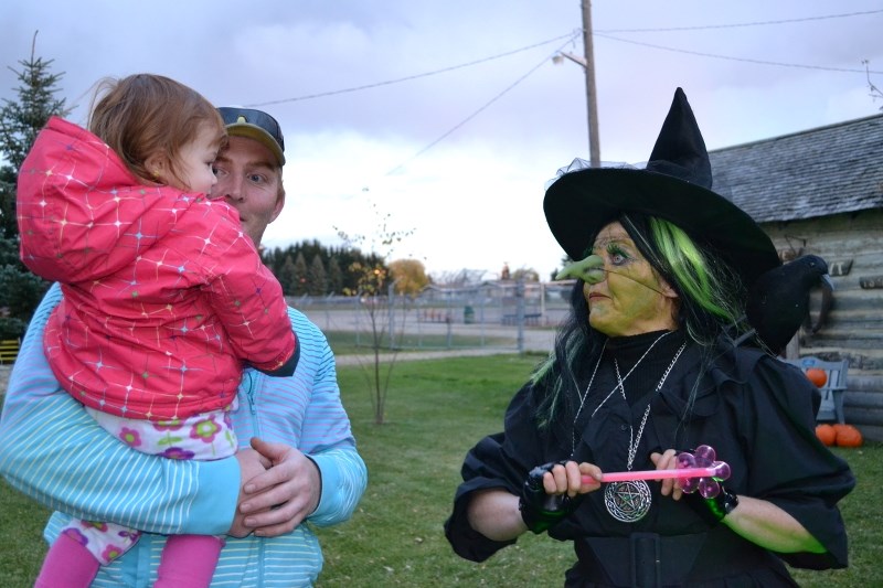 The Wicked Witch of the West triggers the imagination of both old and young at the Halloween Festival.