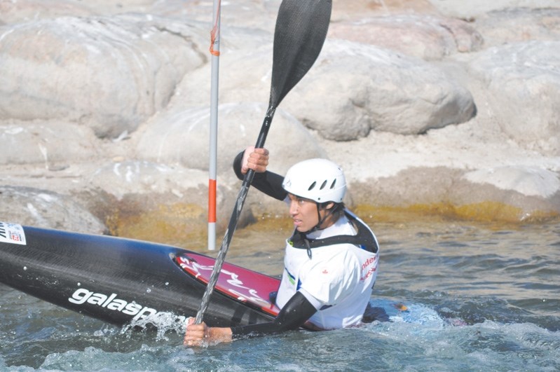 Darius Ramrattan paddles in the water during a training session.