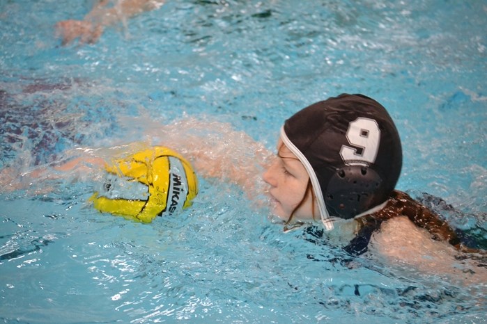 A rush up the pool during one of the games at the water polo clinic held Jan. 30 at the Innisfail Aquatic Centre.