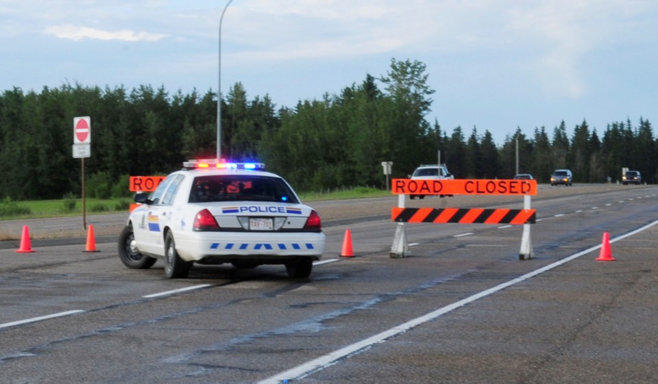 Hwy. 2A south bound was closed Thursday as the investigation of a body found on the side of the road continued.