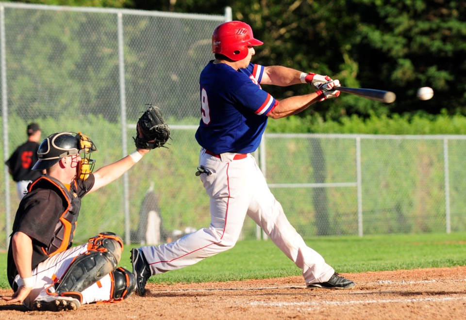 Red Deer Rigger Mike Ronnie makes contact with the ball during one of the Riggers home games at Great Chief Park.