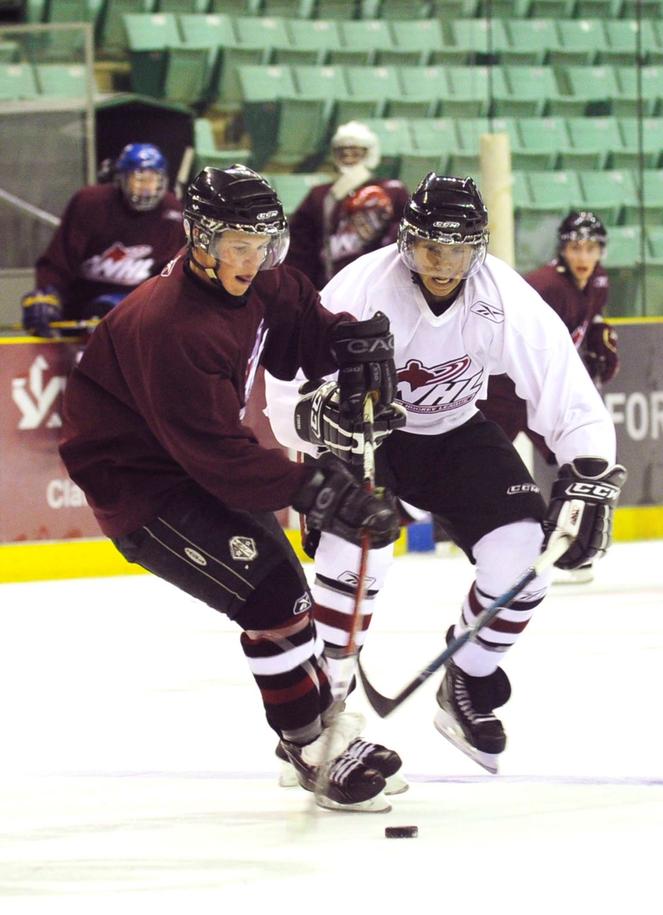 The Red Deer Rebels training camp kicked off this weekend with players coming from all over Alberta. Joel Hamilton, right, from Cochrane, AB tries to steal the puck from