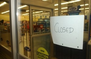 Staff at the Olds Rexall posted a stark &#8216;closed&#8217; sign following an armed robbery last week at the store.