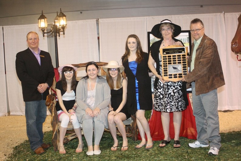 The Hepp family was honoured Saturday as the rural family award recipients for their contributions to the OAS and the community of Olds. Curtis Flewelling, president of the