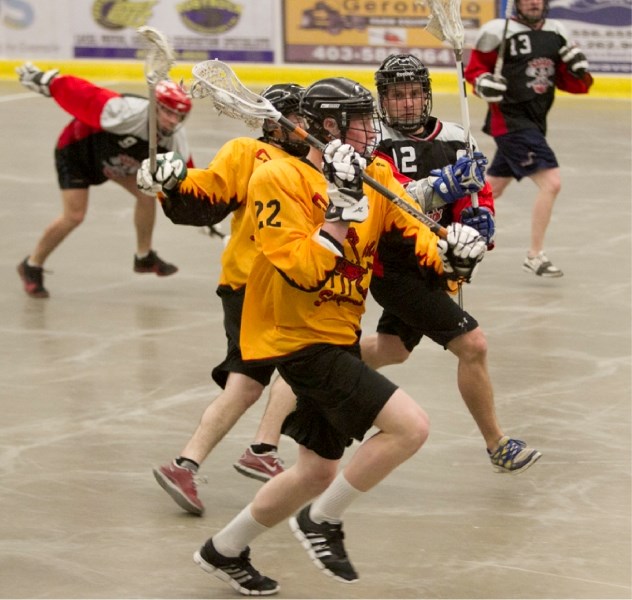 Olds Stingers player Lucas Howard runs down the rink during the Stingers game against the Brooks Drillers at the Olds Sportsplex on April 27. The Stingers won the game 10-7.