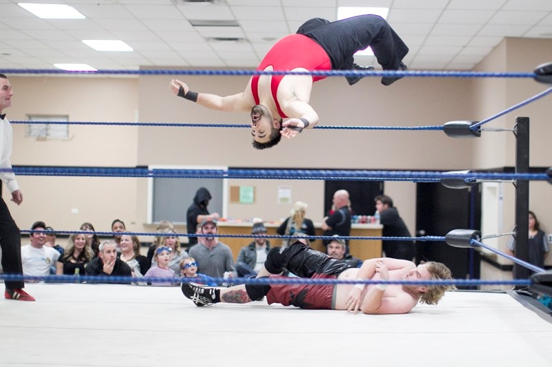 Kieshi Matsunaga flips off the top rope during his match against Colton Kelly during Real Canadian Wrestling&#8217;s event at the Didsbury Memorial Complex on Nov. 29. RCW
