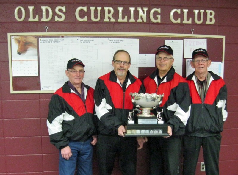 The Olds team of (from left) lead Gene Leonard, skip Jim Dunlop, third Brian Krall and second Dennis Roemmle won the A event at the Olds Seniors Curling Bonspiel held at the