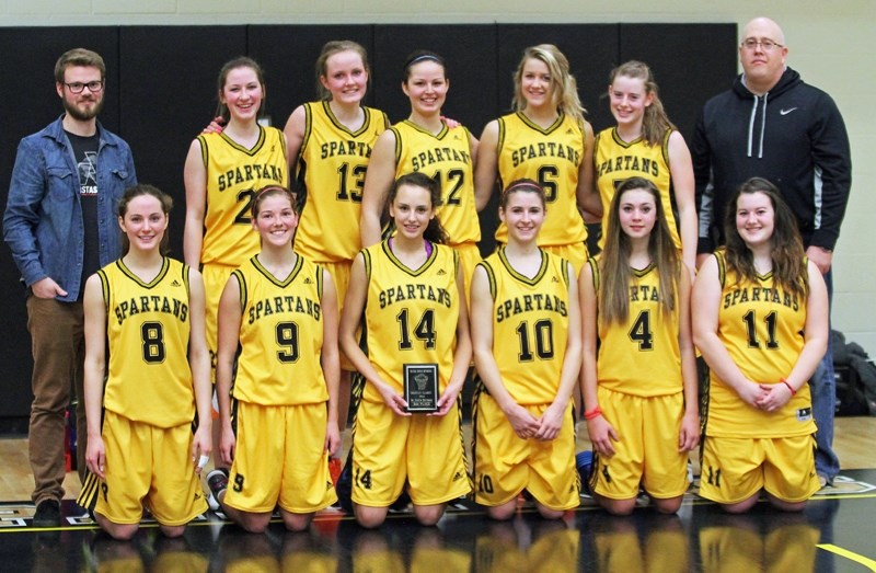 The Olds High School Spartans girls team, coached by Kent Lorenz (far right) and Landan Stones, finished in second place at the Spartan Classic basketball tournament held at