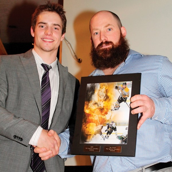 Olds Grizzlys captain Spencer Dorowicz, pictured with the team&#8217;s assistant coach, Dana Lattery, was named the squad&#8217;s most-valuable player and leading scorer for