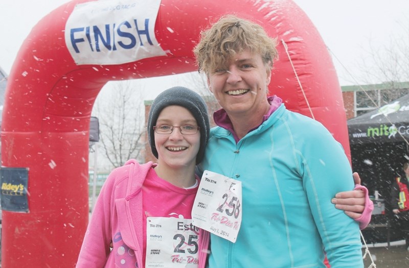 Esther Koelstra, 13, and her mother Rika, both of Olds, competed together in the third-annual Tri-Diva Tri triathlon held in Olds despite the snowy weather on May 3. CLICK ON 