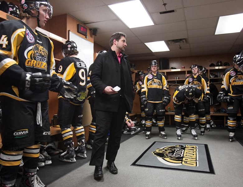 Olds Grizzlys coach Brett Hopfe, who has helmed the team since 2011, speaks to his squad just before their game against the Camrose Kodiaks at the Olds Sportsplex on Feb. 4.