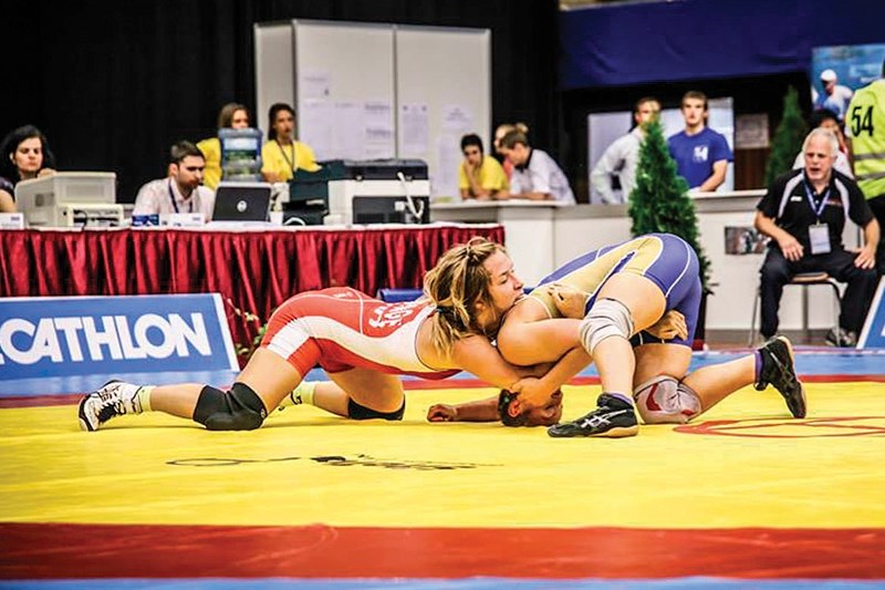 Danielle Lappage, left, captured gold for Canada in wrestling at the World University Championships on July 10 in Pecs, Hungary. Lappage competed in the 63-kilogram weight