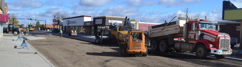 Paving began today (Thursday, Oct. 2) on 50th Avenue as part of the Uptowne Olds revitalization project, which began in July.