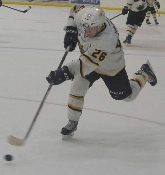 Olds resident Cale Brown takes a shot during a game between the Grizzlys and Spruce Grove Saints Saturday, Oct. 4.