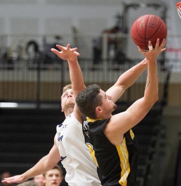 Olds College Broncos player Gio Shettler drives to the hoop during the Broncos game against Briercrest College Clippers at Olds College on Oct. 18.