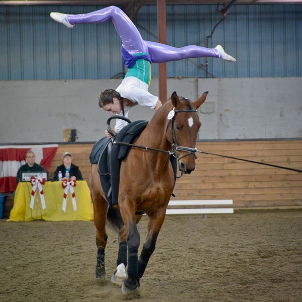 Jeanine van der Sluijs (27) performs as Esmeralda on her horse Kavalia, to win the 2014 VaultCanada National Womens Championship Title.