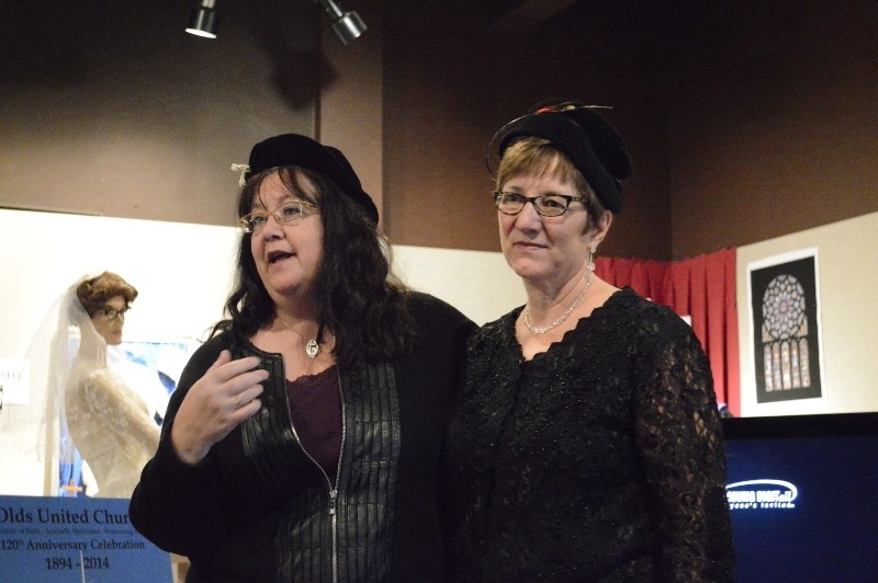 From left, Rev. Tammy Allan and Mary Hays, member of the Olds United Church anniversary committee, speaking at the Mountain View Museum and Archives on Nov. 14. This year,