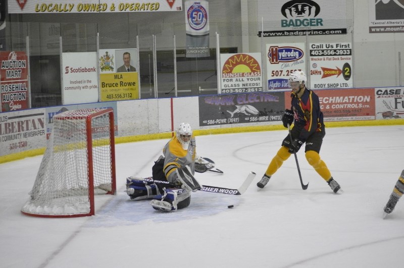 Olds Grizzlys forward Austin Kernahan, playing for the Bulls, is stopped by his teammate Billy Gorn on a breakaway during the Bulls and Bears Hockey Challenge Cup on Nov. 16. 