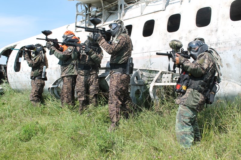 Members of the Primus Knights paintball team practise at the Weekend Warriors Paintball facility south of Olds.