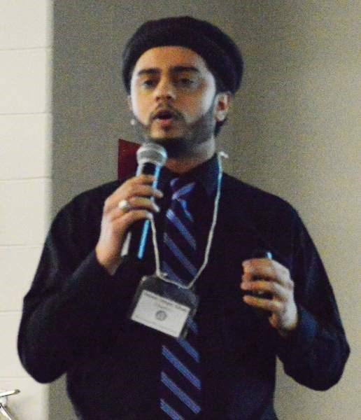 Maulana Umair Khan, a Calgary-based Imam, speaks at the eighth annual World Religions Conference, held at Olds College&#8217;s Alumni Centre on Nov. 18. The topic at hand was 