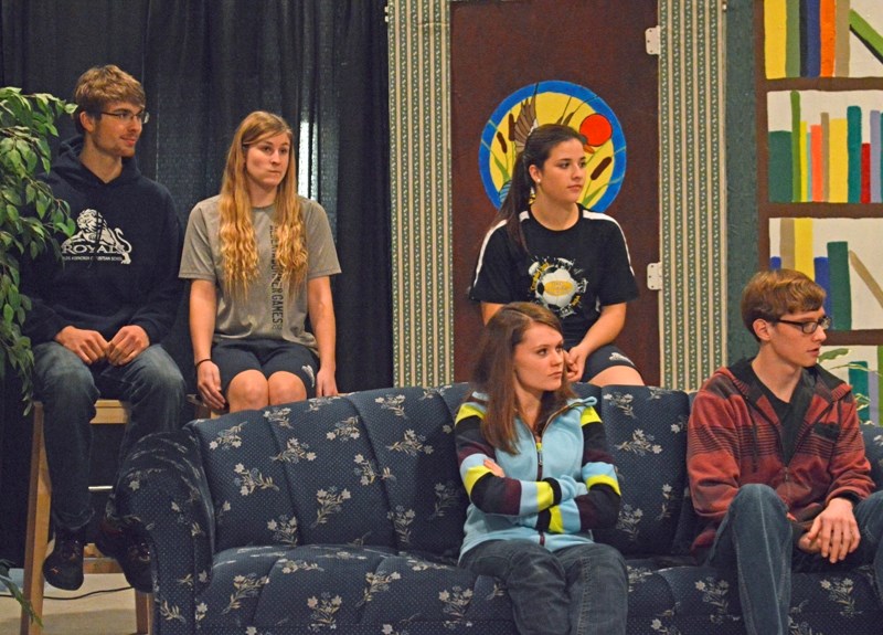 Some members of the cast in rehearsal of Olds Koinonia Christian School&#8217;s production of If the Good Lord&#8217;s Willing and the Creek Don&#8217;t Rise. Back row:
